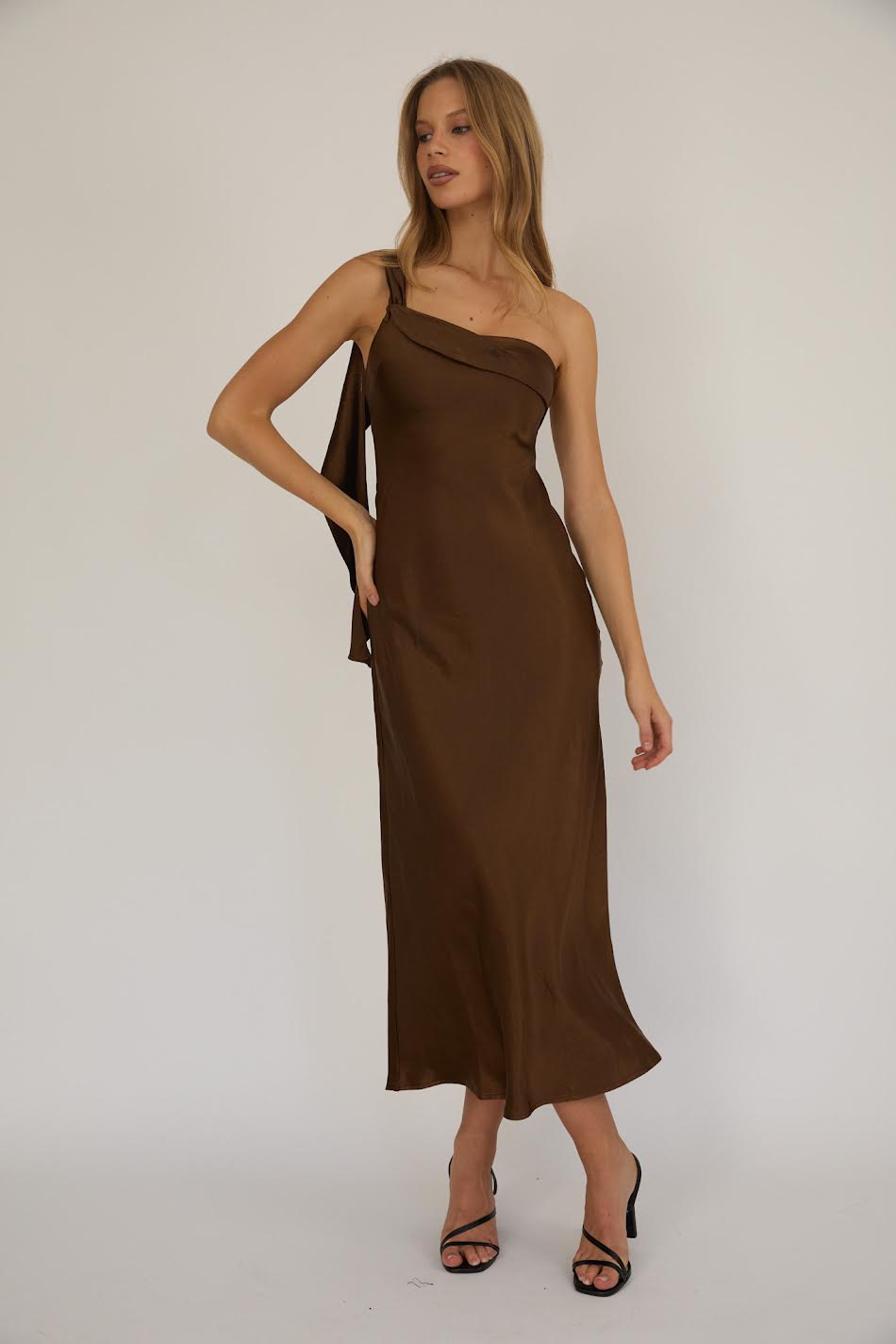 Women's brown satin maxi dress with a flattering fit, ideal for evening events, wedding guests and formal occasions.
