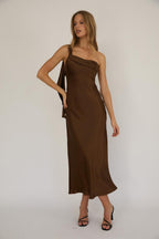 Women's brown satin maxi dress with a flattering fit, ideal for evening events, wedding guests and formal occasions.