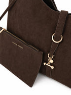 Chocolate brown suede shoulder bag with gold hardware and matching zip pouch for women